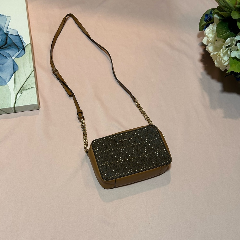 Michael kors grommet cross body